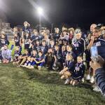 Burnham Midgets hoist the 2022 midget championship for the CKYFL