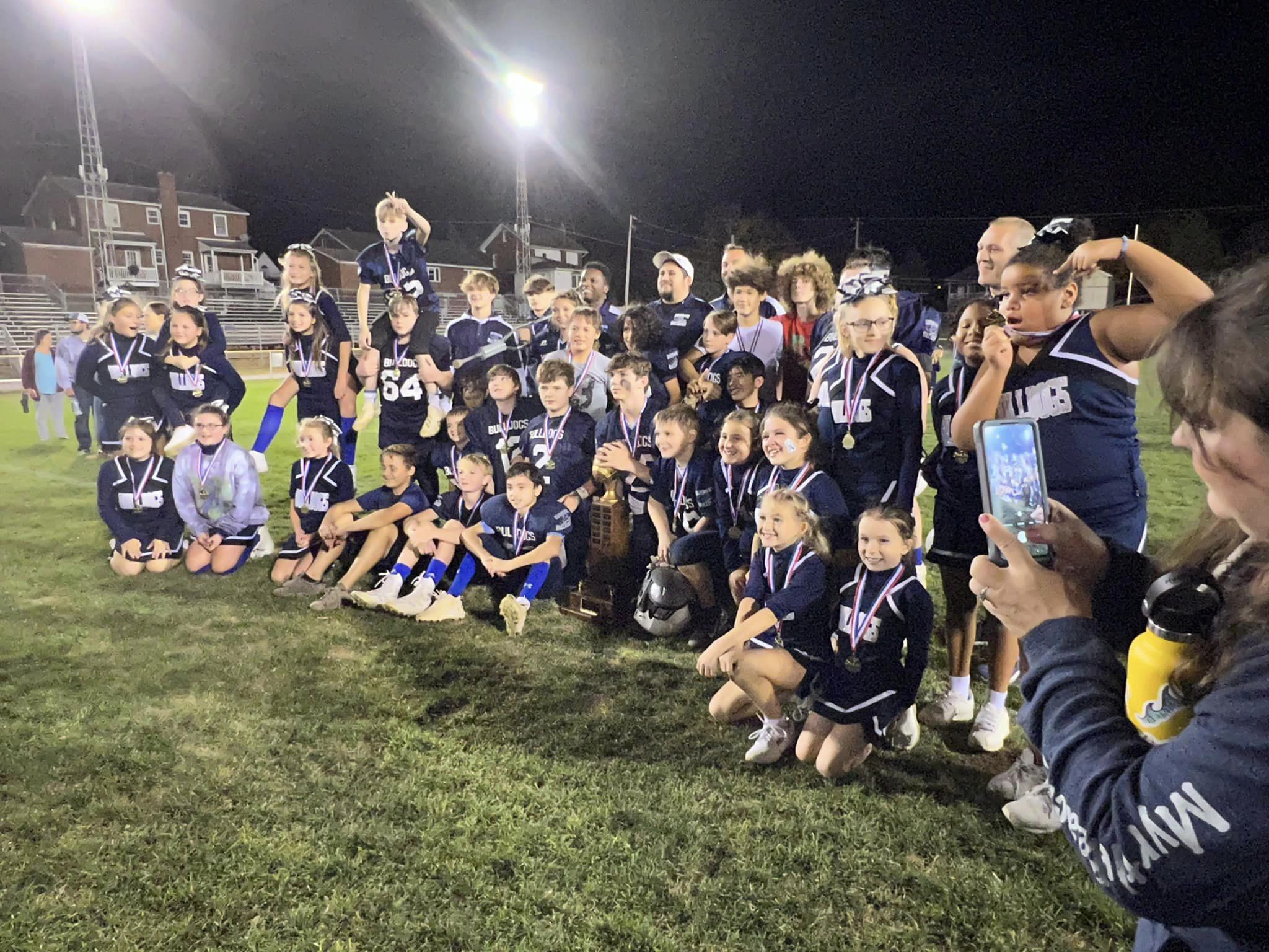 Burnham Midgets hoist the 2022 midget championship for the CKYFL